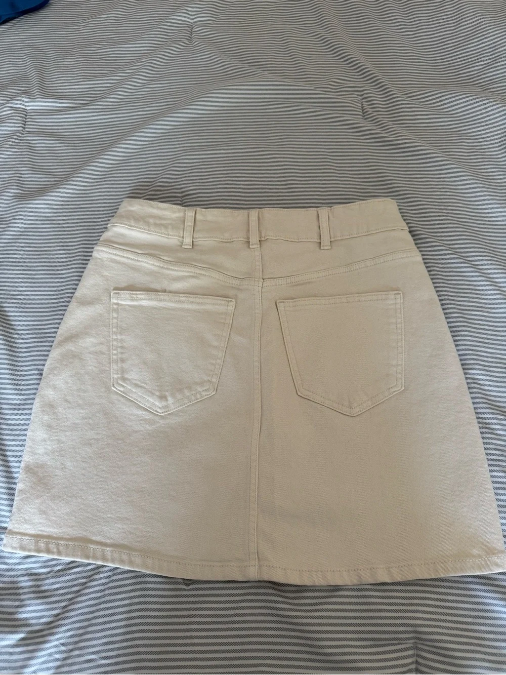 Michael Kors: Button-Front Cream Mini Skirt